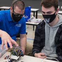 Students update robot designs